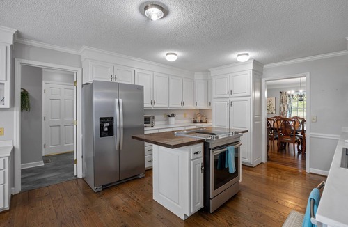 Henderson House | Updated Farmhouse Retreat Near Kerr Lake