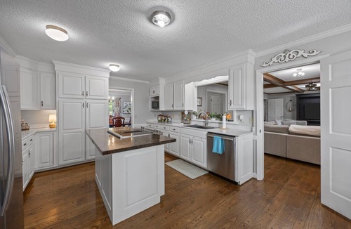 Henderson House | Updated Farmhouse Retreat Near Kerr Lake