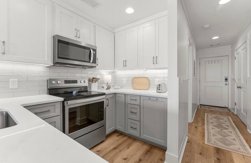 Fort Bay Condo | Updated Latitude 29 #34 Beachfront w/Heated Pool, Hot Tub, Grills, Free Golf!