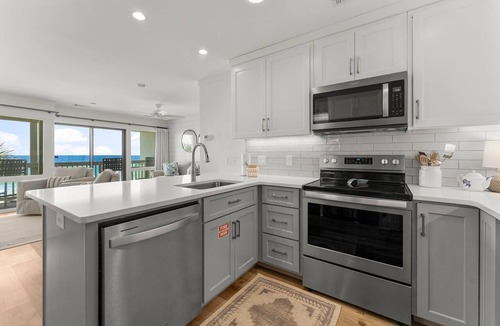 Fort Bay Condo | Updated Latitude 29 #34 Beachfront w/Heated Pool, Hot Tub, Grills, Free Golf!