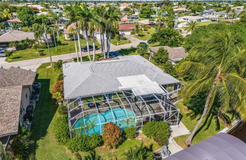 Caloosahatchee House | Waterfront Caribbean-Vibe Paradise with Heated Pool and Boat Dock