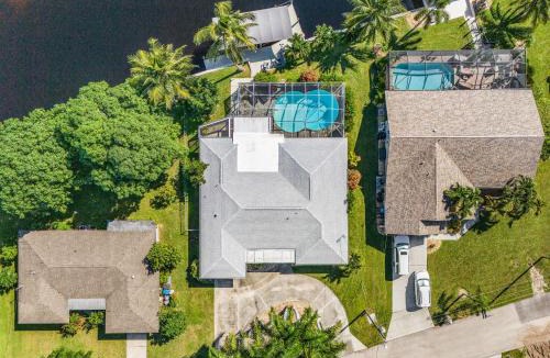 Caloosahatchee House | Waterfront Caribbean-Vibe Paradise with Heated Pool and Boat Dock