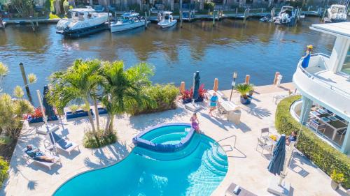 Coral Ridge House | Waterfront Heated pool Dock Access Your Own Resort SaltAire Key RESlDENCES