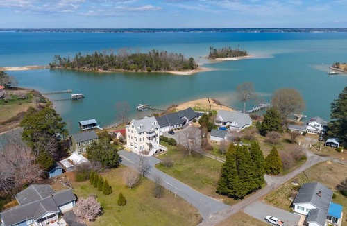 Topping House | Waterfront Home with pool dock gameroom and kayaks