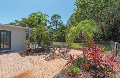 Coquina Sands House | West of 41. Walk 6 minutes to the Lowdermilk beach, theatre, mall and grocery.