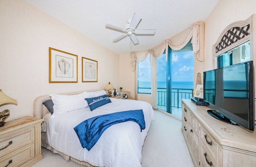 Sand Key Condo | WHITE SANDS BEACHFRONT SUNSET SUNRISE LUX EVERY ROOM SEA 3POOLS SPAS IN/OUT