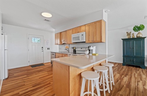 Ocean Cay Apartment | 🌴 Your private island getaway for up to 8 guests 🌴 Perfect for 2 families with separate upstairs & downstairs living 🌴 Heatable tropical pool and outdoor dining 🌴 Walk to 2 restaurants 🌴 2 miles to downtown Fernandina Beach