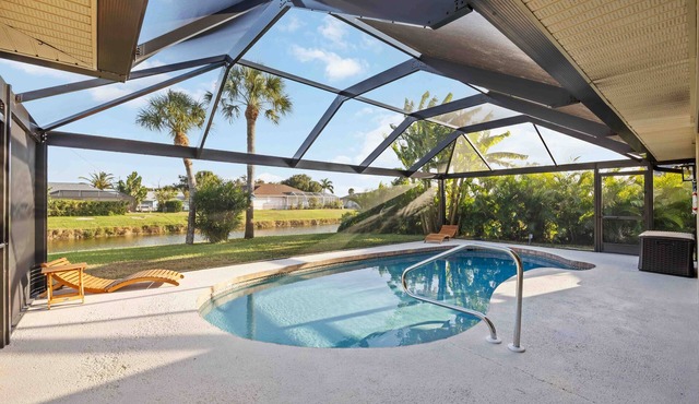 3BR Canal Pool Home, Outdoor TV: Near Manasota Key, Boca Grande and Golf
