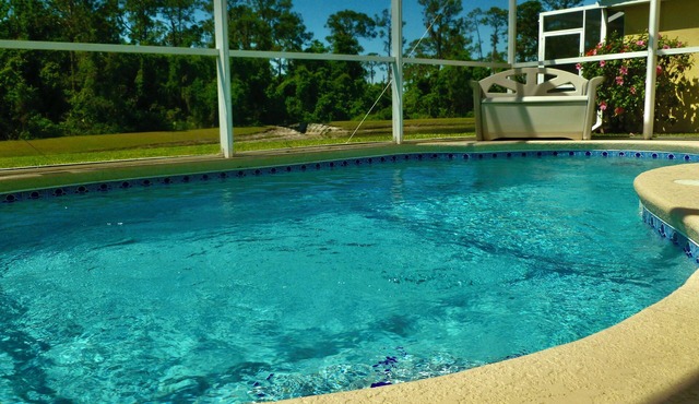 4 bed/3 bath house with private pool overlooking a lake and nature preserve.