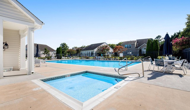 Bayview Landing dog-friendly townhouse with patio, AC, & pool access