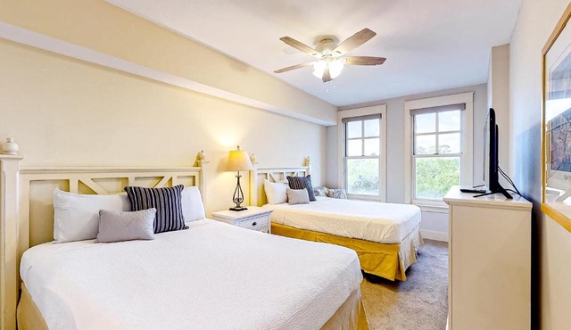 Bright & cozy coastal condo with shared pools hot tubs fast WiFi & central AC