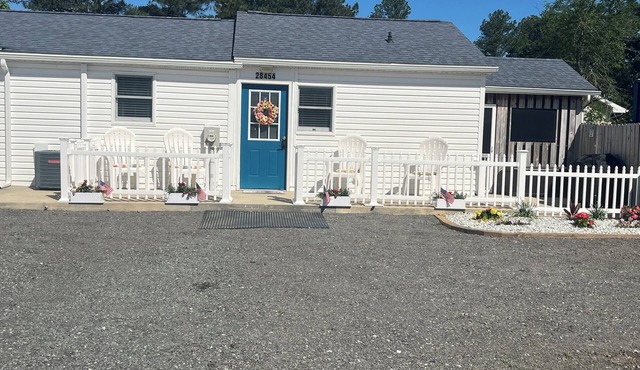 Charming two-bedroom, one bath, with screened porch is your perfect getaway.