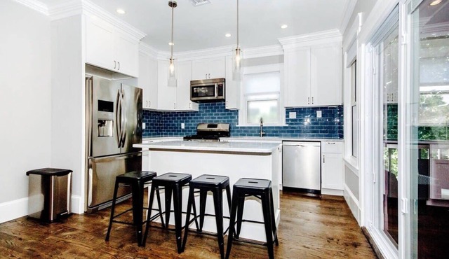 Clean, Contemporary Duplex | Sleeps 20
