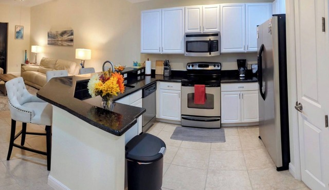 Fabulous 2-bedroom condo inside gated community with close access to the beaches