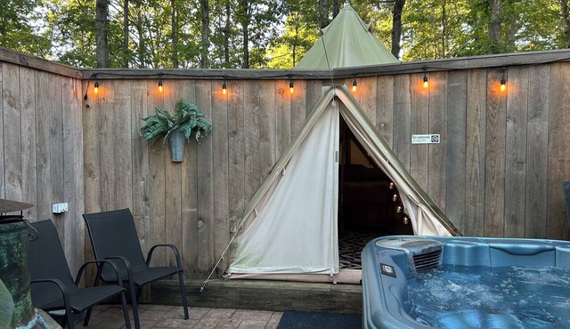 Glamping tent with hot tub and AC for a relaxing getaway