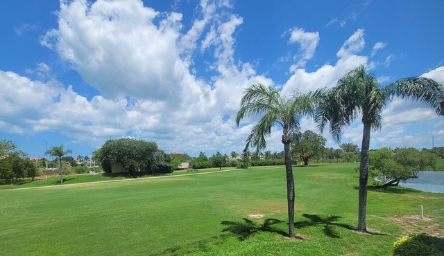 Gorgeous, updated villa overlooking the private golf course of Isla Del Sol!