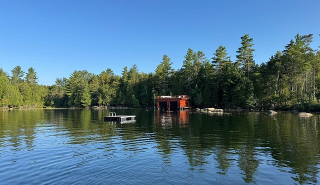 Lakefront Luxury Adirondack Retreat w/Boathouse, Hot Tub & Stunning Views