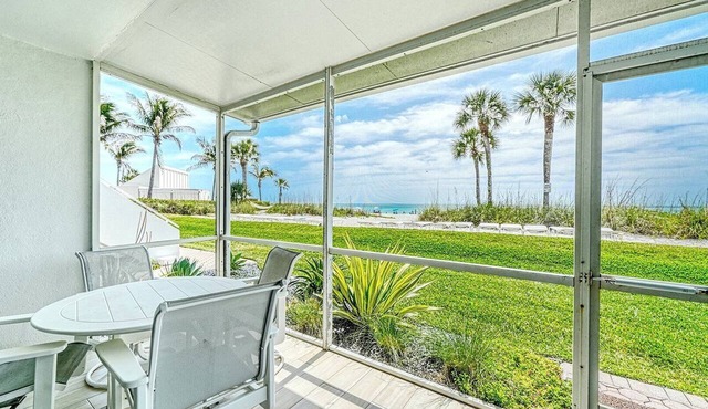 LaPlaya 105B-Relax on the balcony and watch the dolphins swim by!