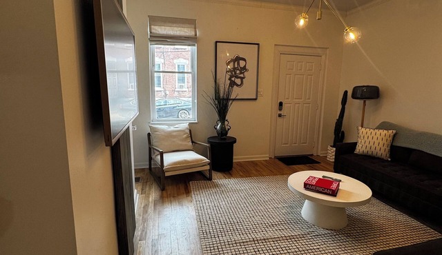 Modern 3BR/2.5BA row home in the heart of Lawrenceville with off-street parking.