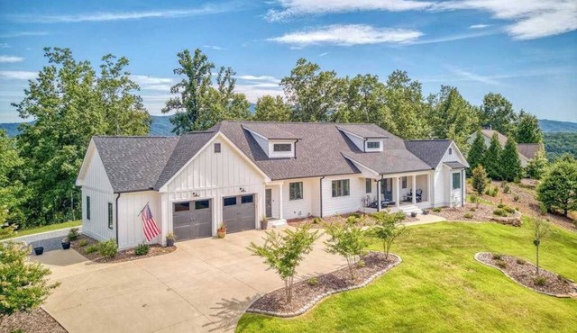 Mountain & lake-view luxury home with hot tub, deck, & pergola - dog-friendly