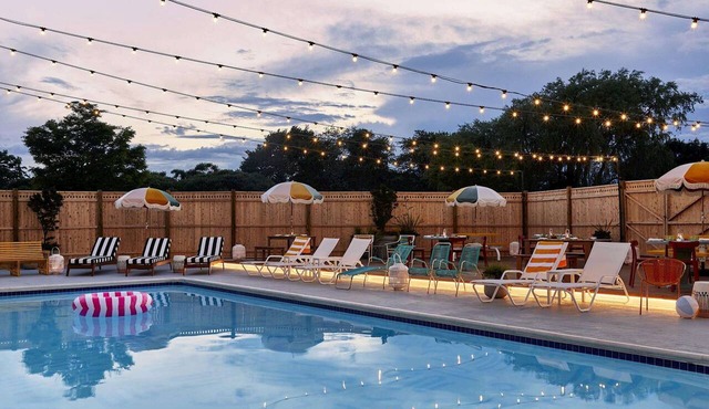 Near Newport Harbor + On-Site Dining. Pool. Bikes.