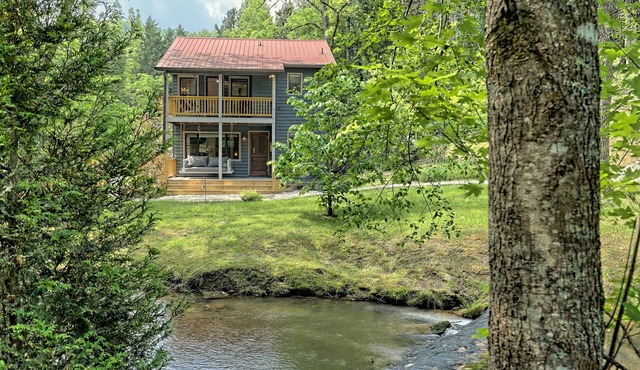 Pet Friendly Renovated Farmhouse with a Serene Rushing Creek and a fenced yard!