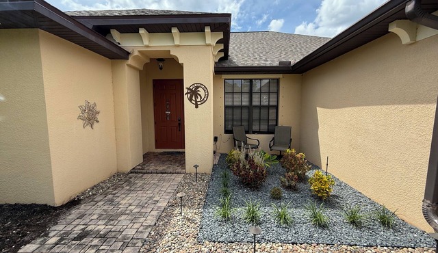 Quiet neighborhood and heated pool. 4 bedroom, three bathroom home.