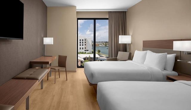Relax in 4 Elegant Rooms with Rooftop Pool and Poolside Umbrellas