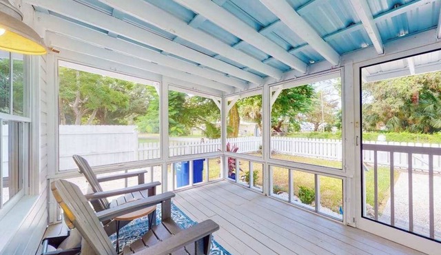 Riverfront dog-friendly cottages with kayaks, dock, patio, grill, & water views