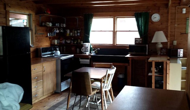 Rustic Camping Cabin with Fireplace in Private Woods near Bangor, Maine in Exeter