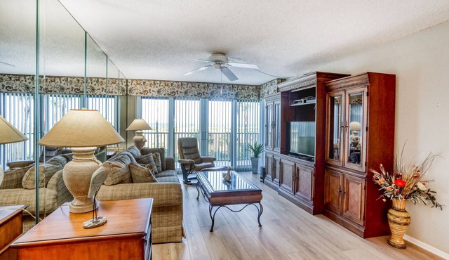 Second-floor condo with pool and tennis court, private W/D, and central AC