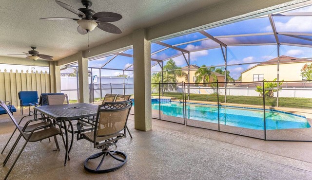 Spacious 5BR Family Retreat w Heated Pool, Game Room & Fenced Yard | Sleeps 12 | Near Disney