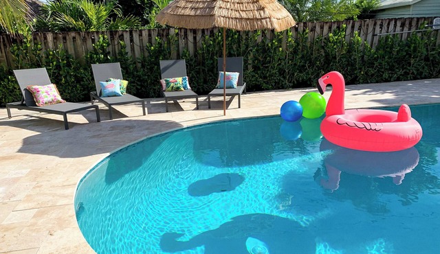 Spacious home with private salt water heated pool minutes to Beach !