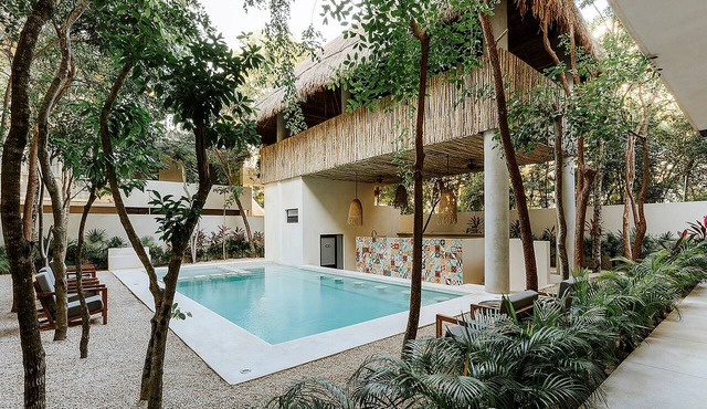 Spacious modern 3-bedroom condo in Aldea Zama with premium finishes, a lush shared pool, and easy access to restaurants, shops, and Tulum’s beaches.