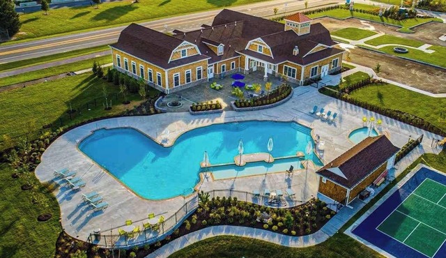 Spacious townhouse near Bethany Beach with community pool, patio, & firepit