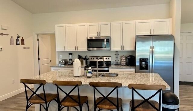 "Stunning New Construction Home w/Heated Pool"