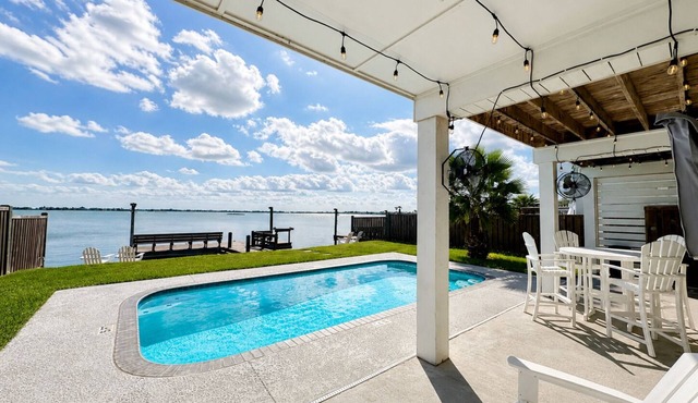 Sunshine Retreat | Waterfront Pool + Lighted Fishing Pier | Sleeps 8