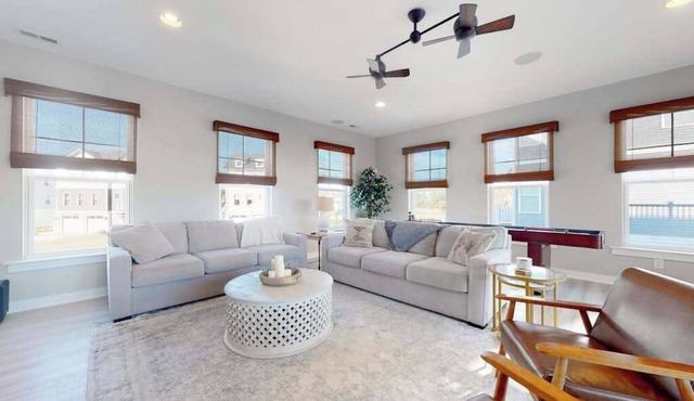 Tidal Walk home with pond views, outdoor pool, decks, fast WiFi, & bikes