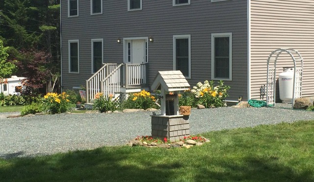 Tucked Inn is a beautiful and peaceful home nestled in the woods on 3 acres