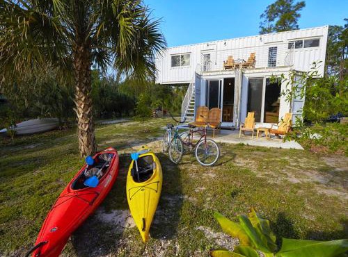 Upcycled Shipping Containers Transformed into a Glamping Home for a Unique Florida Vacation