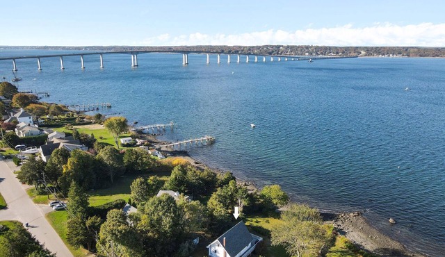 Waterfront A-frame Chalet with shore beach overlooking Narragansett Bay