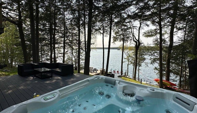 Waterfront open concept dream cottage with hot tub