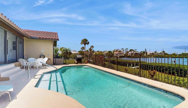 Waterfront pool home, family friendly, close to beaches with AC, WD and WIFI
