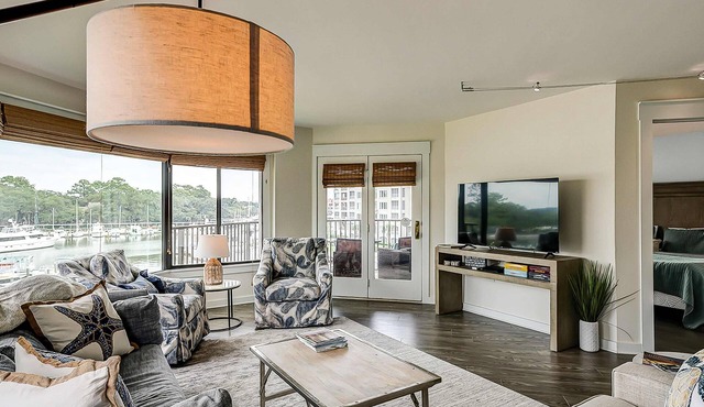 Yacht Club Villas | Updated corner condo with marina view, shared pool & hot tub