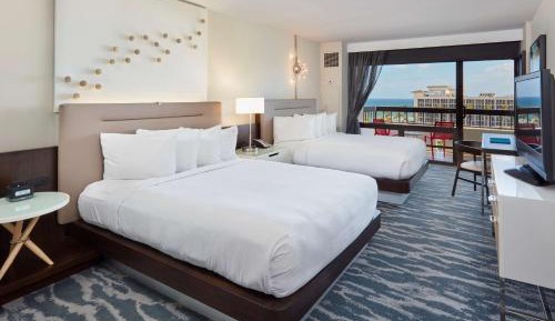 Queen Room with Two Queen Beds, Balcony, and Water View