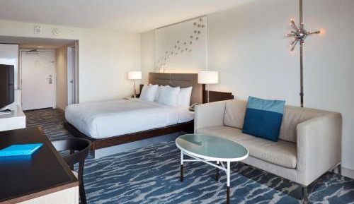 King Room with Balcony, Sofa Bed, and Water View