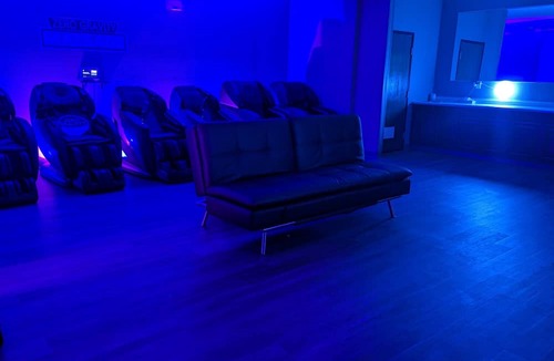 Indianapolis Apartment | Beds Are Overrated. Choose Luxury Massage Chairs. A 1 of a Kind Experience.